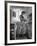 Career Girl Hostedd Joan Wilson in skirt and sleeveless blouse cooking in kitchen-Nina Leen-Framed Photographic Print