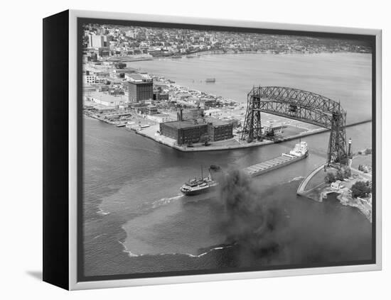 Cargo Boat Passing under Bridge-Charles Rotkin-Framed Premier Image Canvas