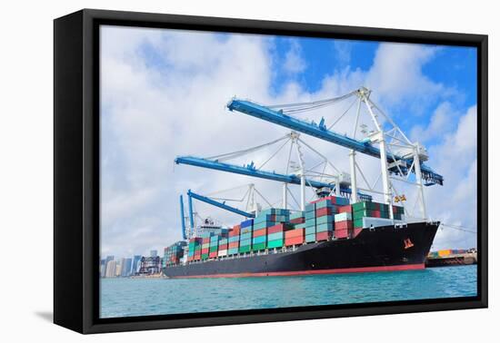 Cargo Ship at Miami Harbor with Crane and Blue Sky over Sea.-Songquan Deng-Framed Premier Image Canvas