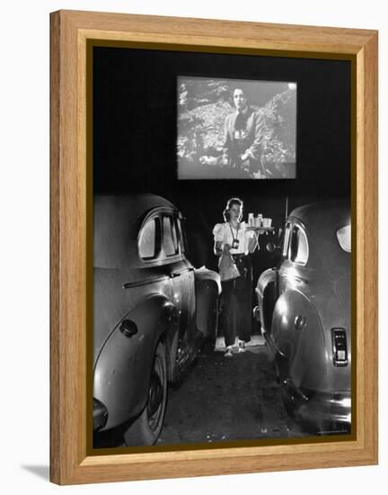 Carhop Carries Tray of Food and Drinks to Car Occupants at Drive-in Movie-Allan Grant-Framed Premier Image Canvas