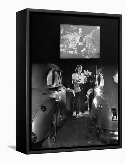 Carhop Carries Tray of Food and Drinks to Car Occupants at Drive-in Movie-Allan Grant-Framed Premier Image Canvas