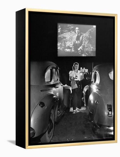 Carhop Carries Tray of Food and Drinks to Car Occupants at Drive-in Movie-Allan Grant-Framed Premier Image Canvas