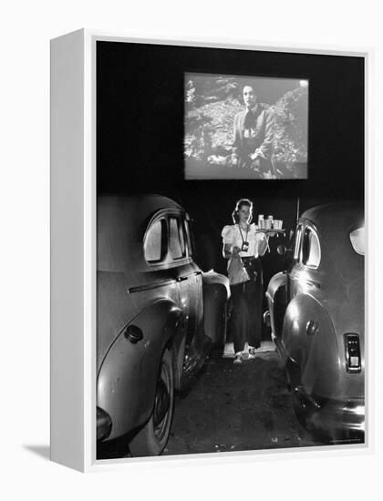 Carhop Carries Tray of Food and Drinks to Car Occupants at Drive-in Movie-Allan Grant-Framed Premier Image Canvas