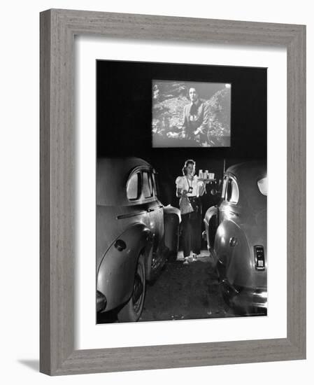 Carhop Carries Tray of Food and Drinks to Car Occupants at Drive-in Movie-Allan Grant-Framed Photographic Print