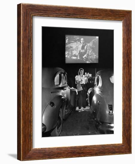 Carhop Carries Tray of Food and Drinks to Car Occupants at Drive-in Movie-Allan Grant-Framed Photographic Print