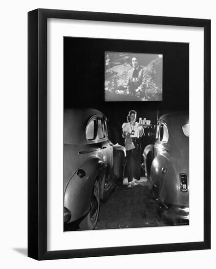 Carhop Carries Tray of Food and Drinks to Car Occupants at Drive-in Movie-Allan Grant-Framed Photographic Print