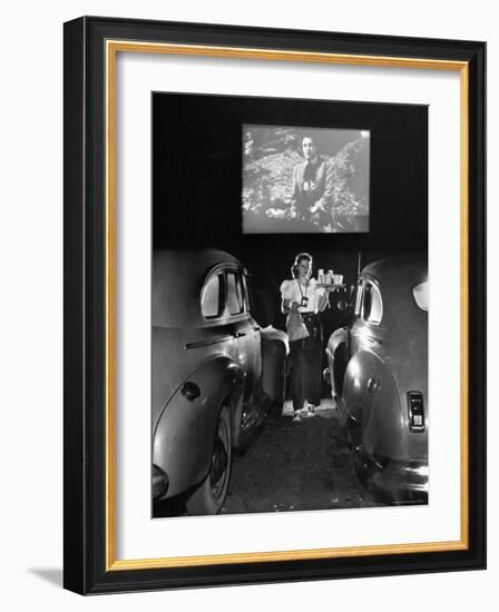 Carhop Carries Tray of Food and Drinks to Car Occupants at Drive-in Movie-Allan Grant-Framed Photographic Print