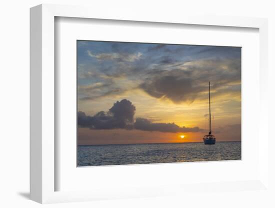 Caribbean, Grenada, Mayreau Island. Sailboat at anchor at sunset.-Jaynes Gallery-Framed Photographic Print