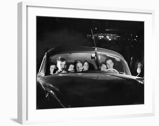 Carload of Happy Movie Fans Incl. Parents with Their Kids Who Get in Free-Francis Miller-Framed Photographic Print