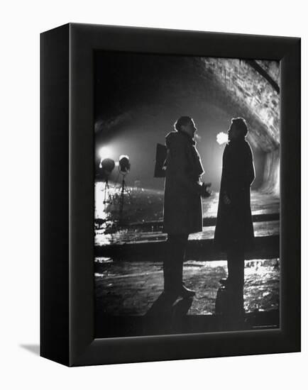 Carol Reed Coaching Orson Welles as They Stand Against Floodlights During Filming "The Third Man."-William Sumits-Framed Premier Image Canvas