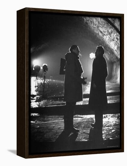 Carol Reed Coaching Orson Welles as They Stand Against Floodlights During Filming "The Third Man."-William Sumits-Framed Premier Image Canvas