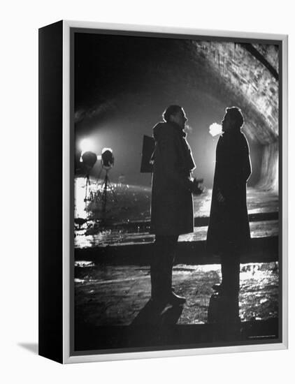 Carol Reed Coaching Orson Welles as They Stand Against Floodlights During Filming "The Third Man."-William Sumits-Framed Premier Image Canvas