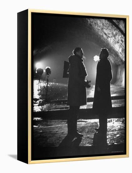 Carol Reed Coaching Orson Welles as They Stand Against Floodlights During Filming "The Third Man."-William Sumits-Framed Premier Image Canvas