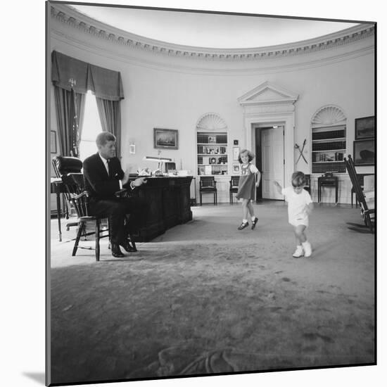 Caroline and John Jr. Dance in the Oval Office as President Kennedy Claps. 1962-null-Mounted Photo