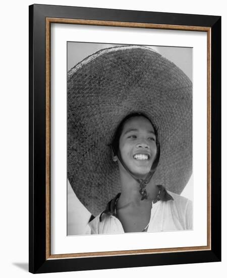Caroline Native Boy Wearing Huge Straw Hat Made of Pandanus Fiber-Eliot Elisofon-Framed Photographic Print