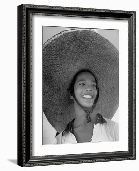 Caroline Native Boy Wearing Huge Straw Hat Made of Pandanus Fiber-Eliot Elisofon-Framed Photographic Print