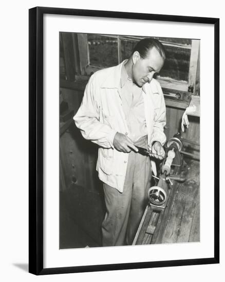 Carpenter at Work in His Woodshop-null-Framed Photo