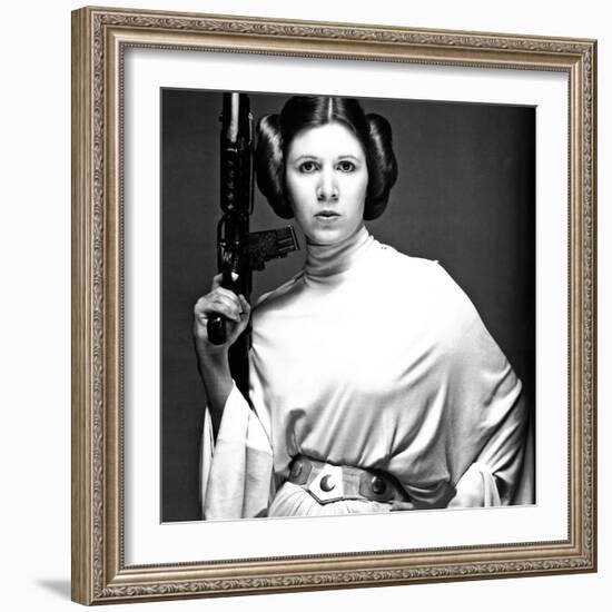 CARRIE FISHER. "Star Wars: Episode IV-A New Hope" [1977], directed by GEORGE LUCAS.-null-Framed Photographic Print