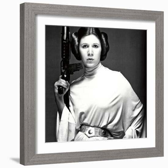 CARRIE FISHER. "Star Wars: Episode IV-A New Hope" [1977], directed by GEORGE LUCAS.-null-Framed Photographic Print