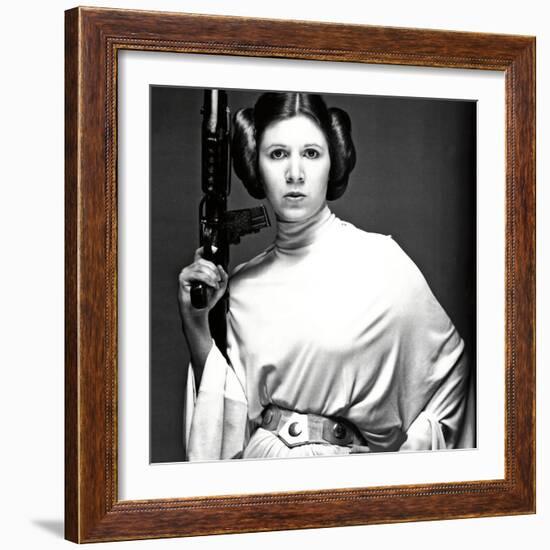 CARRIE FISHER. "Star Wars: Episode IV-A New Hope" [1977], directed by GEORGE LUCAS.-null-Framed Photographic Print