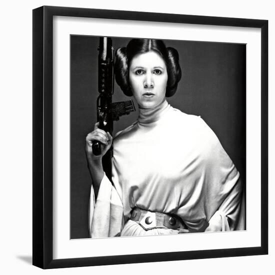 CARRIE FISHER. "Star Wars: Episode IV-A New Hope" [1977], directed by GEORGE LUCAS.-null-Framed Photographic Print