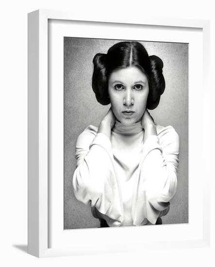 CARRIE FISHER. "Star Wars: Episode IV-A New Hope" [1977], directed by GEORGE LUCAS.-null-Framed Photographic Print