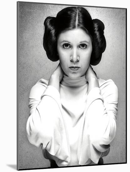 CARRIE FISHER. "Star Wars: Episode IV-A New Hope" [1977], directed by GEORGE LUCAS.-null-Mounted Photographic Print