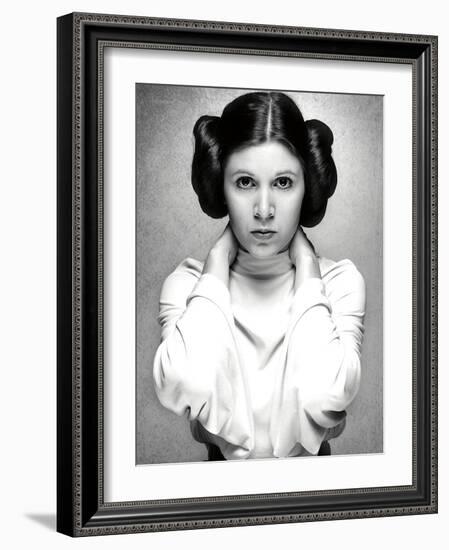 CARRIE FISHER. "Star Wars: Episode IV-A New Hope" [1977], directed by GEORGE LUCAS.-null-Framed Photographic Print