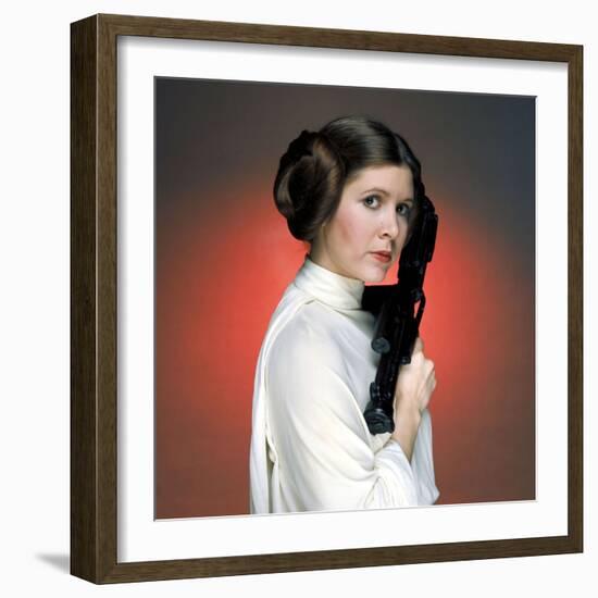 CARRIE FISHER. "Star Wars: Episode IV-A New Hope" [1977], directed by GEORGE LUCAS.-null-Framed Photographic Print