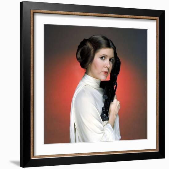 CARRIE FISHER. "Star Wars: Episode IV-A New Hope" [1977], directed by GEORGE LUCAS.-null-Framed Photographic Print