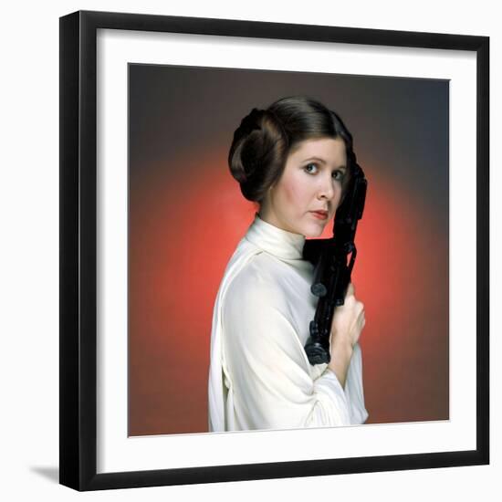 CARRIE FISHER. "Star Wars: Episode IV-A New Hope" [1977], directed by GEORGE LUCAS.-null-Framed Photographic Print