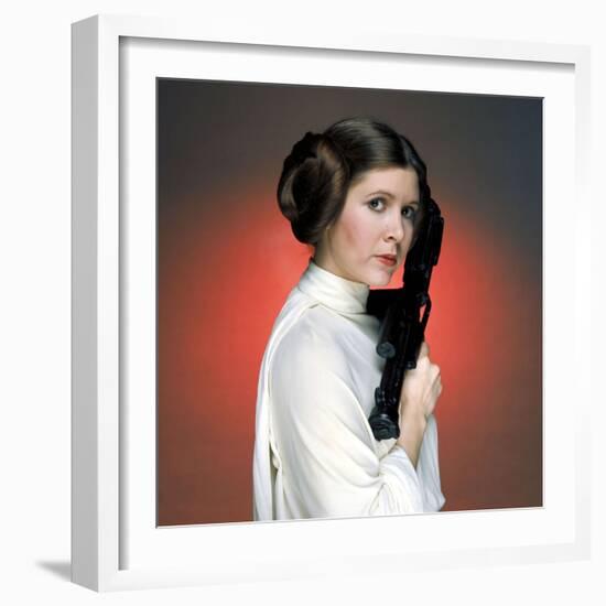 CARRIE FISHER. "Star Wars: Episode IV-A New Hope" [1977], directed by GEORGE LUCAS.-null-Framed Photographic Print