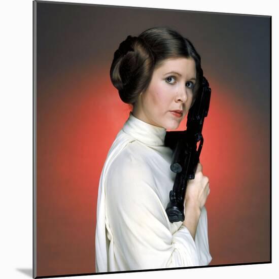 CARRIE FISHER. "Star Wars: Episode IV-A New Hope" [1977], directed by GEORGE LUCAS.-null-Mounted Photographic Print