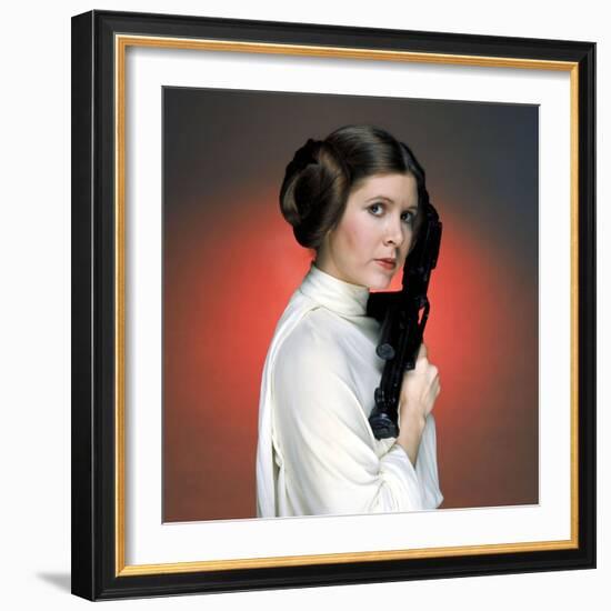 CARRIE FISHER. "Star Wars: Episode IV-A New Hope" [1977], directed by GEORGE LUCAS.-null-Framed Photographic Print