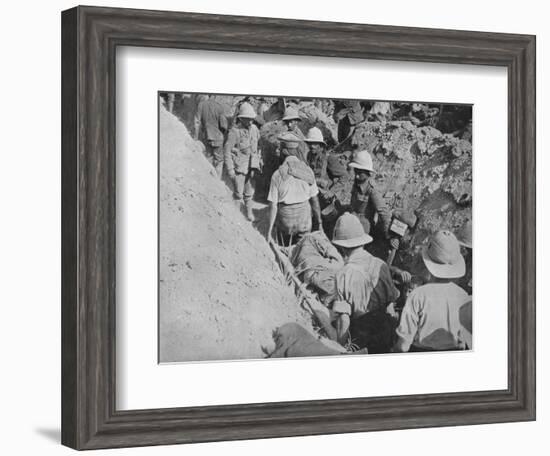 'Carrying wounded through the trenches', 1915-Unknown-Framed Photographic Print