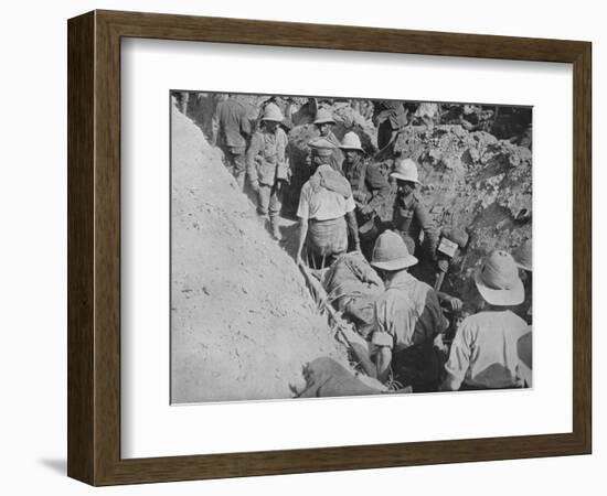 'Carrying wounded through the trenches', 1915-Unknown-Framed Photographic Print