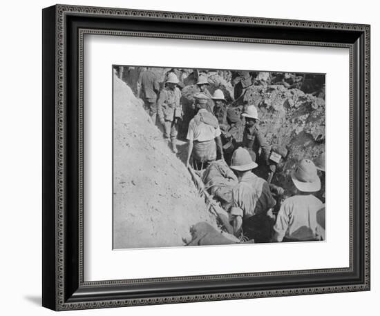 'Carrying wounded through the trenches', 1915-Unknown-Framed Photographic Print