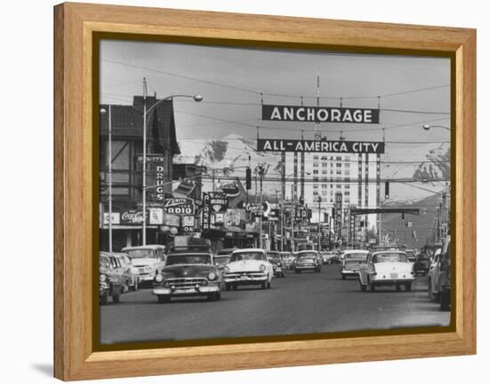 Cars Driving Through City-Nat Farbman-Framed Premier Image Canvas