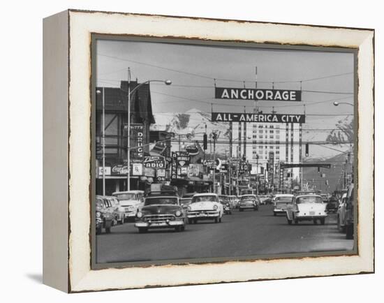 Cars Driving Through City-Nat Farbman-Framed Premier Image Canvas