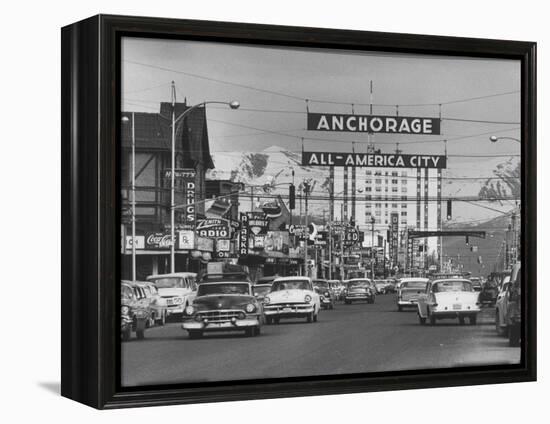 Cars Driving Through City-Nat Farbman-Framed Premier Image Canvas