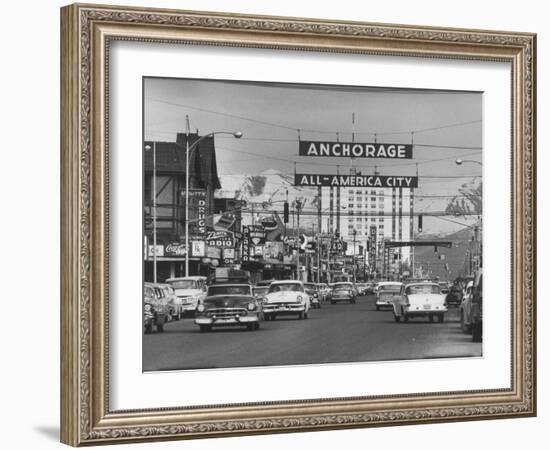 Cars Driving Through City-Nat Farbman-Framed Photographic Print