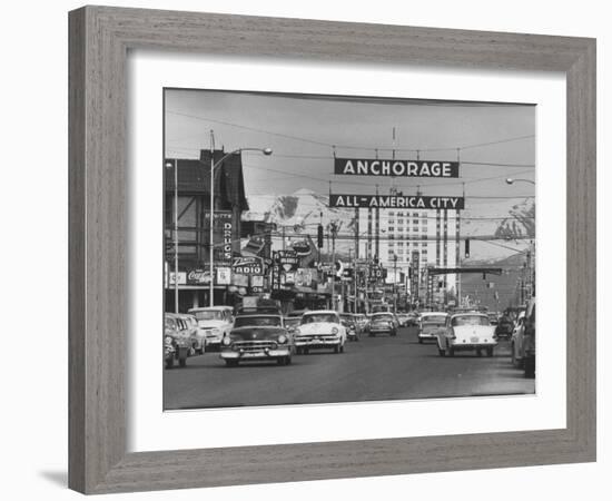 Cars Driving Through City-Nat Farbman-Framed Photographic Print