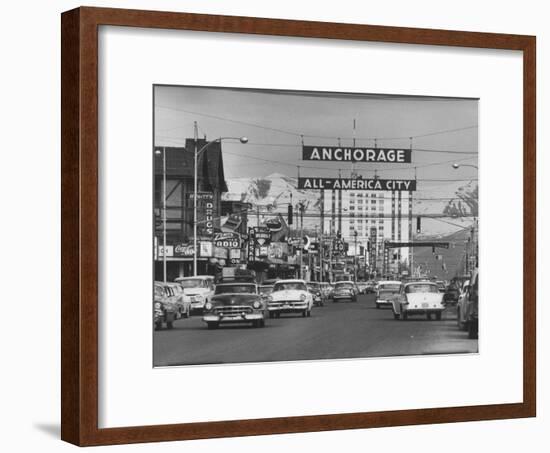 Cars Driving Through City-Nat Farbman-Framed Photographic Print