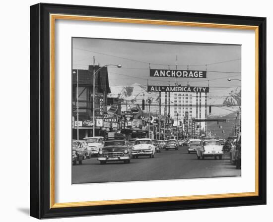 Cars Driving Through City-Nat Farbman-Framed Photographic Print