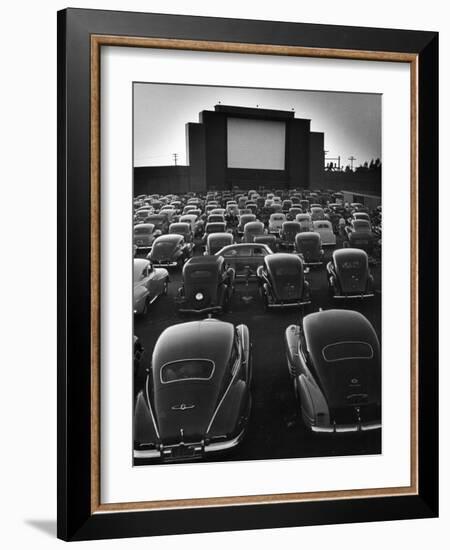 Cars Filling Lot at New Rancho Drive in Theater at Dusk Before the Start of the Feature Movie-Allan Grant-Framed Photographic Print