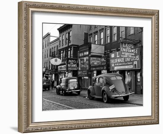 Cars Parked in Front of Four Navy Uniform Stores on Sand Street-Andreas Feininger-Framed Photographic Print