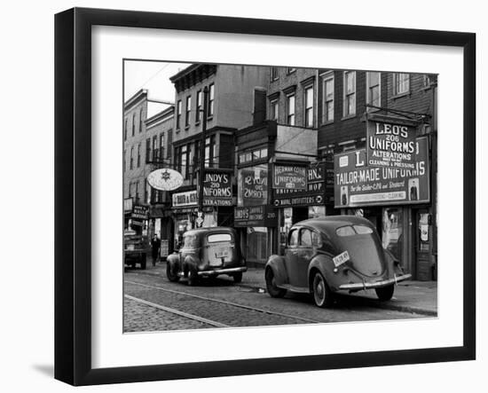 Cars Parked in Front of Four Navy Uniform Stores on Sand Street-Andreas Feininger-Framed Photographic Print