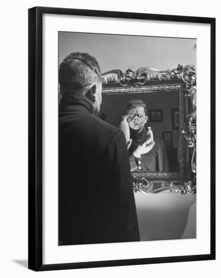 Cartoonist Charles Addams Experimenting with Scary Faces for His Cartoon, The Addams Family-Al Fenn-Framed Premium Photographic Print