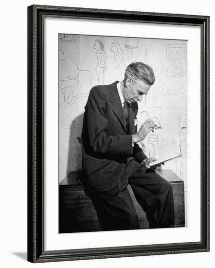 Cartoonist James Thurber Posing with His Work-Bob Landry-Framed Premium Photographic Print