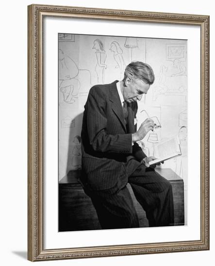 Cartoonist James Thurber Posing with His Work-Bob Landry-Framed Premium Photographic Print